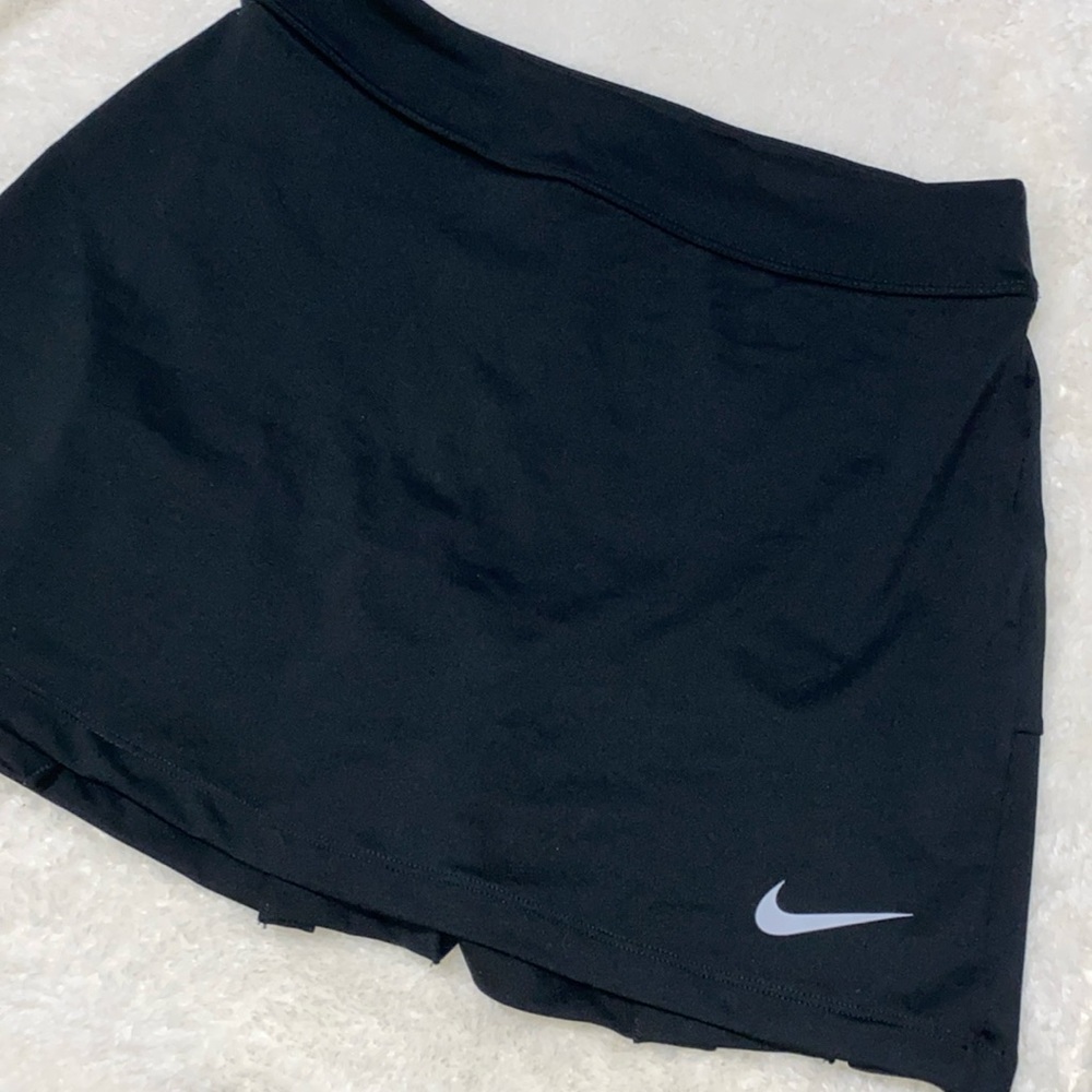 NIKE women’s dri fit golf mini skirt - size XS